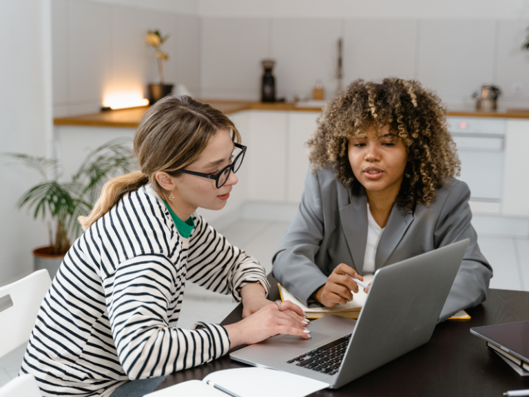 Two Women At A Computer